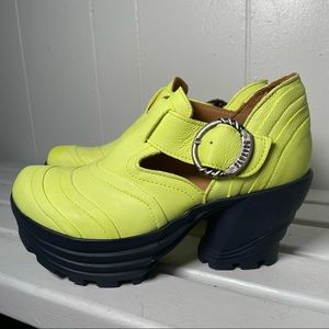 John Fluevog neon yellow clog shoe 9, but fits small.  Fits more like 7 or 8